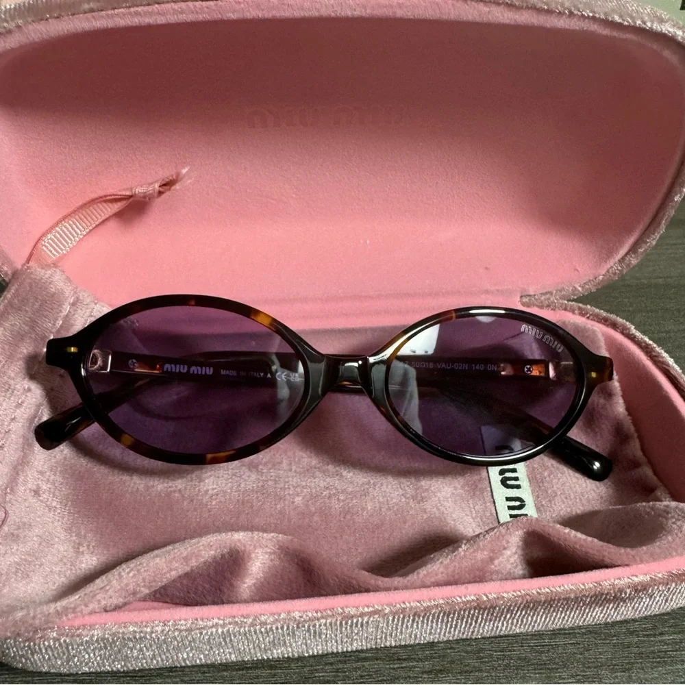 Miu Miu Tortoiseshell Oval Sunglasses with Purple Lenses - Picture 1 of 8